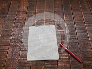 Notepad with wood table handle. photo