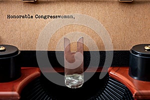 Write to congress, democratic process and voter expressing concerns to elected official conceptual idea with vintage typewriter, photo
