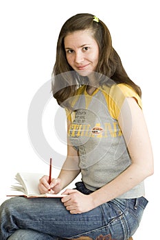 A writer girl with note pad photo