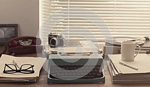 Writer and journalist vintage desktop with typewriter