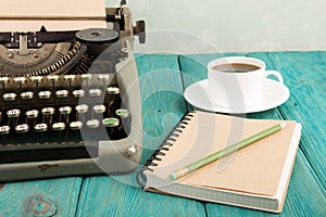 writer's workplace - wooden desk with typewriter