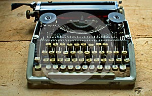 Writers block, Old typewriter on a antic wooden table