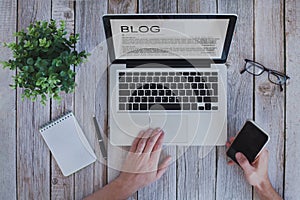 Writing a blog, blogger influencer reading text on screen