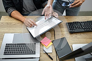 Writing codes and typing data code technology, Programmer team working on web site project in a software development on desktop