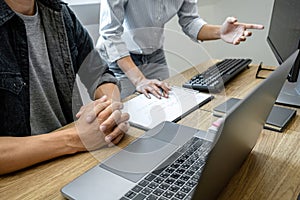 Writing codes and typing data code technology, Programmer team working on web site project in a software development on desktop