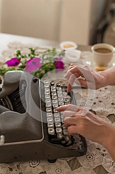 Writing concept. Typing on retro typewriter.