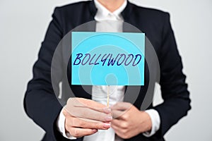 Writing displaying text Bollywood. Word for one who organizes and assumes the risks of a business Businesswoman