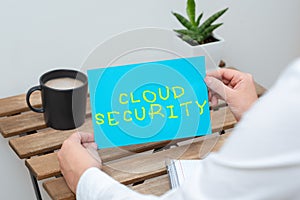 Writing displaying text Cloud Security. Business overview Imposing a secured system of existing data in the Internet