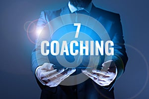 Writing displaying text 7 Coaching. Business idea Refers to a number of figures regarding business to be succesful photo
