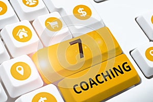 Hand writing sign 7 Coaching. Business overview Refers to a number of figures regarding business to be succesful photo