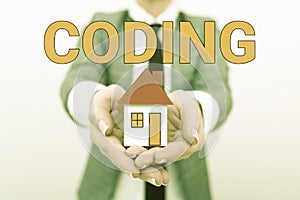 Writing displaying text Coding. Word for assigning code to something for classification identification Real Estate Agent