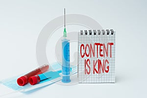 Writing displaying text Content Is King. Business concept marketing focused growing visibility non paid search results