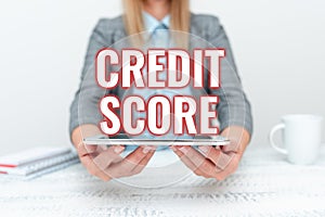 Writing displaying text Credit Score. Internet Concept Represent the creditworthiness of an individual Lenders rating