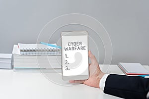 Writing displaying text Cyber Warfare. Business overview Virtual War Hackers System Attacks Digital Thief Stalker