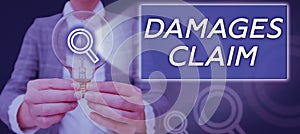 Writing displaying text Damages Claim. Business approach Demand Compensation Litigate Insurance File Suit