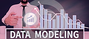 Text sign showing Data Modeling. Concept meaning process of transferring data between data storage systems