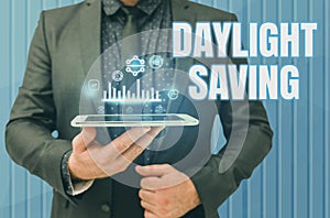 Writing displaying text Daylight Saving. Concept meaning Storage technologies that can be used to protect data Man