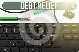 Writing displaying text Debt Relief. Conceptual photo partial or total remission of it especially those by countries