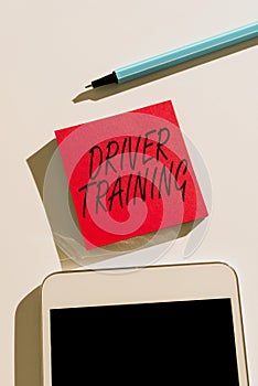Writing displaying text Driver Trainingprepares a new driver to obtain a driver's license. Word Written on
