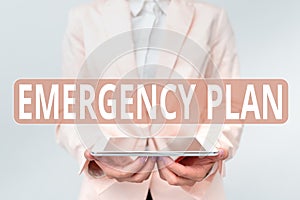 Writing displaying text Emergency Plan. Business overview procedures for handling sudden or unexpected situations