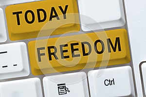 Writing displaying text Freedom. Concept meaning power or right to act speak or think as one wants without hindrance photo