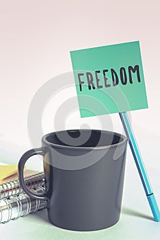 Handwriting text Freedom. Business approach power or right to act speak or think as one wants without hindrance Notebook photo