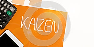 Writing displaying text Kaizen. Business overview a Japanese business philosophy of improvement of working practices