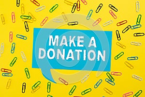 Writing displaying text Make A Donation. Business approach Donate giving things not used any more to needed showing