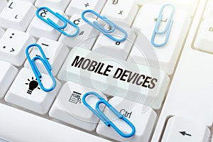 Writing displaying text Mobile Devices. Business overview A portable computing device like smartphone tablet computer