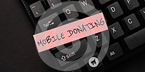 Writing displaying text Mobile Donating. Concept meaning to give something to a charity or any cause using personal