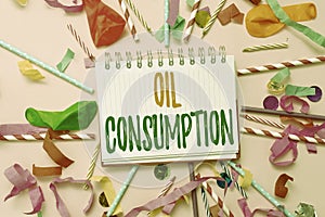 Writing displaying text Oil Consumption. Internet Concept This entry is the total oil consumed in barrels per day