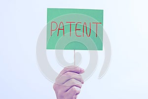 Writing displaying text Patent. Business concept intellectualproperty that gives owner legal right has the sole right photo