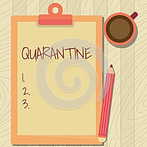 Writing displaying text Quarantine. Concept meaning restraint upon the activities of person or the transport of goods photo