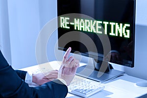 Writing displaying text Re Marketing. Word for Strategy to reach potential customers in your website Woman Typing Updates On Lap