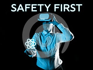 Writing displaying text Safety First. Conceptual photo Avoid any unnecessary risk Live Safely Be Careful Pay attention