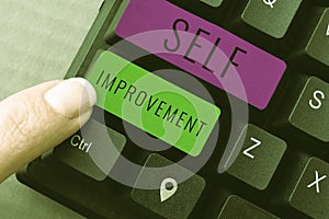 Hand writing sign Self Improvement. Business concept process of making yourself a better or more knowledgable photo
