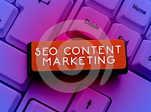 Writing displaying text Seo Content Marketing. Concept meaning publication of material designed to promote a brand