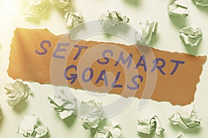 Writing displaying text Set Smart Goals. Business concept Establish achievable objectives Make good business plans