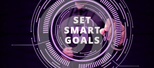 Writing displaying text Set Smart Goals. Business showcase Establish achievable objectives Make good business plans