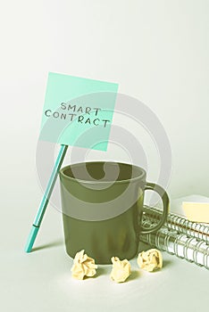 Writing displaying text Smart Contract. Business approach digital agreement to control the transfer of digital