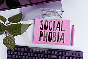 Writing displaying text Social Phobia. Business concept overwhelming fear of social situations that are distressing