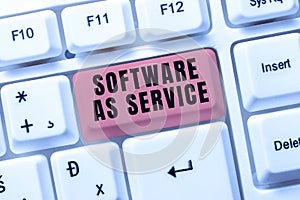 Writing displaying text Software As Service. Business overview On Demand licensed on Subscription and centrally hosted