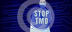 Writing displaying text Stop Tmd. Word for Prevent the disorder or problem affecting the chewing muscles photo
