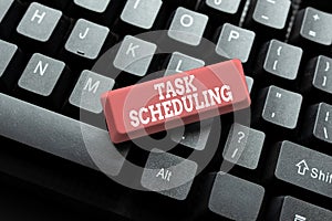 Writing displaying text Task Scheduling. Word for The assignment of start and end times to a set of tasks Abstract