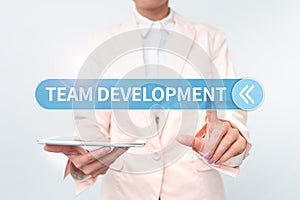 Sign displaying Team Development. Business idea learn why and how small groups change over time with graphs Presenting