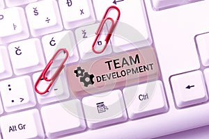 Writing displaying text Team Developmentlearn why and how small groups change over time with graphs. Internet Concept