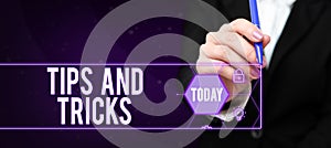 Writing displaying text Tips And Tricks. Business concept helpful advices that makes certain action easier to do