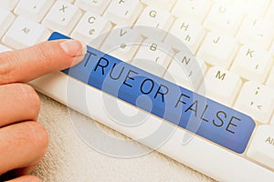 Writing displaying text True Or False. Word for Decide between a fact or telling a lie Doubt confusion -48985