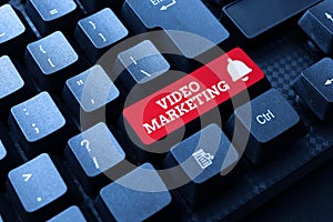 Writing displaying text Video Marketing. Concept meaning using videos to promote and market your product or service