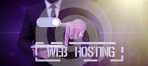 Writing displaying text Web Hosting. Internet Concept The activity of providing storage space and access for websites Lady in suit